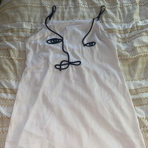 Crème and black dress